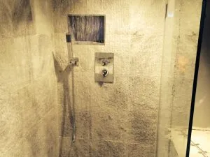 Bathroom renovation to wet room in Islington, showing modern, fully tiled wet room