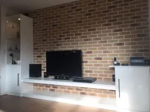 Brick slip wall installation in Limehouse residential interior, showing modern feature wall finish