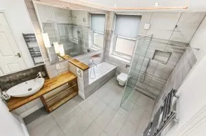 Large family bathroom renovation with wetroom and bath.